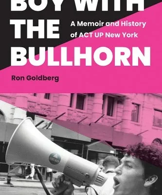 Pink cover with a black and white picture of a young man with a bullhorn. Title across the top